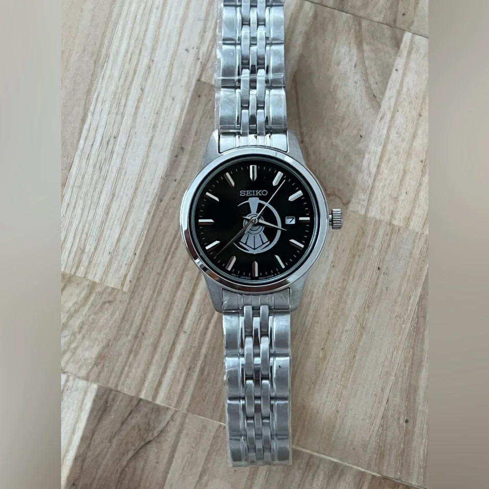 Seiko Ladies Watch Black Dial with Train Motif Stainless Bracelet and Hands